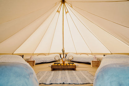 Space in a Quad Bell Tent (sharing with up to 3 others) and a Festival Ticket